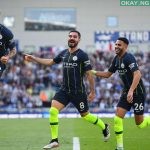 Manchester City players celebrating goals against Brighton and Hove Albion