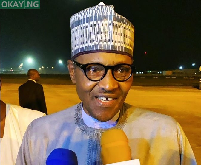 President Muhammadu Buhari speaking to newsmen on his arrival