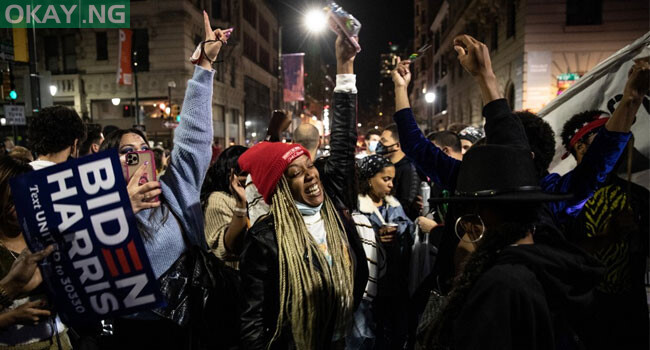 People dance in street after listening to President-elect Joe Biden address the nation after being declared the winner of the 2020 presidential election on November 07, 2020, in Philadelphia, Pennsylvania. 