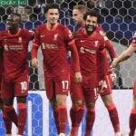 Liverpool’s Egyptian forward Mohamed Salah (2R) celebrates scoring the opening goal during the UEFA Champions League first round group B footbal match between Porto and Liverpool at the Dragao stadium in Porto on September 28, 2021.