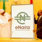 President Muhammadu Buhari and CBN Governor Godwin Emefiele launching the eNaira at Aso Rock presidential villa, Abuja on Monday.