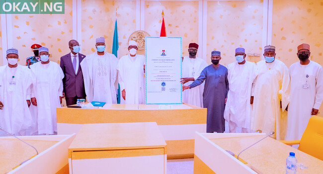 President Buhari with the Permanent Secretary Ministry of Finance, Budget & National Planning Aliyu Ahmed, Chief of Staff Ibrahim Gambari, Minister of State Petroleum Timpre Sylva, SGF Boss Mustapha, GMD NNPC Mele Kyari, Registrar Corporate Affairs Commission Alhaji Garba Abubakar, Permanent Secretary Ministry of Petroleum Resources Dr. Nasir Sani Gwarzo and NNPC CFO Umar Isa Ajiya as he receives Certificate of Incorporation of the Nigeria National Petroleum Corporation in State House on October 8, 2021