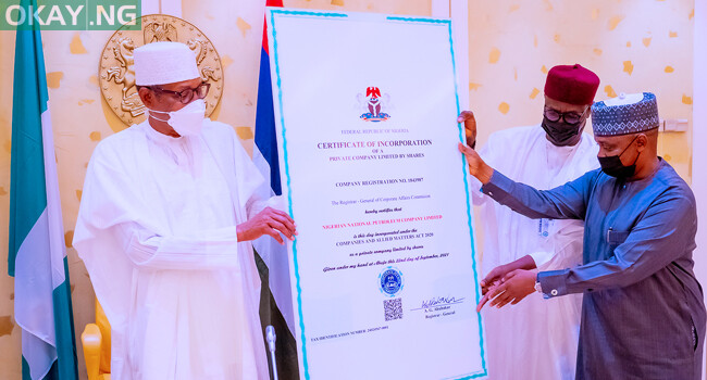 President Buhari receives the Certificate of Incorporation of the Nigeria National Petroleum Corporation on October 8.