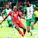 Nigeria’s defender Semi Ajayi (R) fights for the ball with Guinea-Bissau’s forward Jefferson Encada during the Group D Africa Cup of Nations (AFCON) 2021 football match at Stade Roumde Adjia in Garoua on January 19, 2022. Daniel BELOUMOU OLOMO / AFP