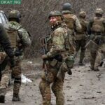 Ukrainian servicemen get ready to repel an attack in Ukraine’s Lugansk region on February 24, 2022. Anatolii STEPANOV / AFP