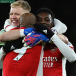 Arsenal’s French striker Alexandre Lacazette (C) celebrates with Arsenal’s English goalkeeper Aaron Ramsdale (L) and Arsenal’s English striker Eddie Nketiah (R) on the final whistle in the English Premier League football match between Arsenal and Wolverhampton Wanderers at the Emirates Stadium in London on February 24, 2022. Arsenal won the game 2-1. Glyn KIRK / AFP