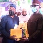 From Left: Representative of Dangote Group Alh Abdulsalam Waya, former President of KADCCIMA Hajiya Farida Muhibat Dankaka, and Minister of Industry, Trade and Investment Otunba Niyi Adebayo during the Minister's visit to the Dangote pavilion at the ongoing 43rd Kaduna International Trade Fair