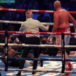 Britain’s Tyson Fury (R) knocks out Britain’s Dillian Whyte in the sixth round to win their WBC heavyweight title fight at Wembley Stadium in west London, on April 23, 2022. – Tyson Fury stopped British rival Dillian Whyte in the sixth round to retain his WBC heavyweight crown at a packed Wembley on Saturday. In his first fight on UK soil in four years, Fury was treated to a hero’s welcome by a 94,000-capacity crowd and largely dictated the tempo before ending proceedings in devastating fashion. (Photo by Adrian DENNIS / AFP)