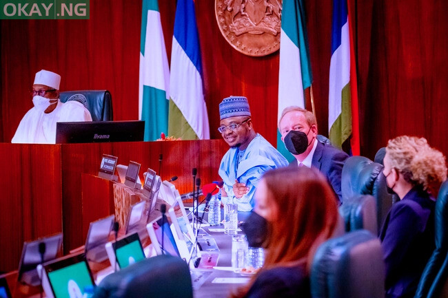 President Buhari receives a presentation from President and Executive Vice Chairman, Microsoft Corporation Brad Smith alongside Hon. Minister of Communication and Digital Economy Isa Ali Ibrahim Pantami during his audience with President of Microsoft Corporation in State House on 1st April 2022