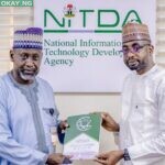 R-L: Kashifu Inuwa, the Director-General, National Information Technology Development Agency (NITDA), presenting the Agency’s Strategy Document to Professor Musa Isyaku Ahmed, the Vice Chancellor, Federal University of Agriculture Zuru