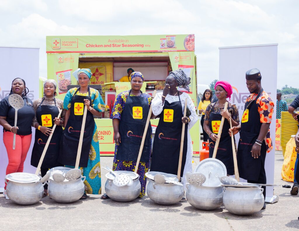 Funmi Osineye, Manager, Nestlé Professional Nigeria left, with winners of the cooking competitions displaying their gifts.