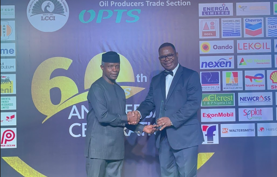 Vice President Prof. Yemi Osinbajo present an award to Mr Basil Omiyi, past Chairman, OPTS & Chairman Seplat at the 60th-anniversary celebration of OPTS at Eko Hotel, Lagos on Thursday.