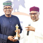 L-R: Aliko Dangote, President/CE, Dangote Industries Limited, (Guest lecturer) receiving an award from Engr. Mansur Ahmed, President, Manufacturers Association of Nigeria (MAN) during 50th Annual General Meeting (AGM) of Manufacturers Association of Nigeria and 2nd Adeola Odutola Lecture and Presidential Luncheon in Lagos on Tuesday, October 18, 2022