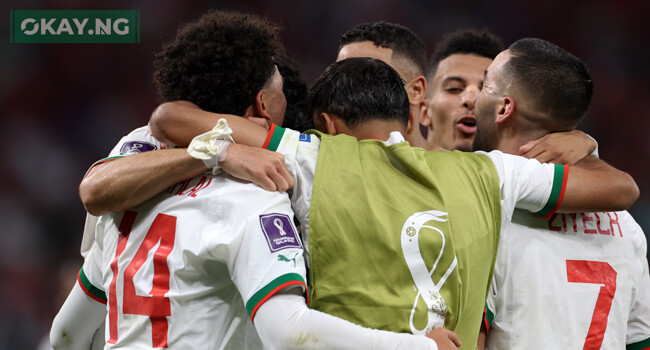 Morocco’s forward #14 Zakaria Aboukhlal (L) celebrates with teammates after scoring his team’s second goal during the Qatar 2022 World Cup Group F football match between Belgium and Morocco at the Al-Thumama Stadium in Doha on November 27, 2022. (Photo by Fadel Senna / AFP)