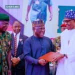 President Muhammadu Buhari, presenting the 2022 Nigerian Army Recognition Award to Abdul Samad Rabiu, Founder and Chairman, BUA Group while Lieutenant General Faruk Yahaya, the Chief of Army Staff looks on during the 2022 Chief of Army Staff Conference in Sokoto State, North West Nigeria