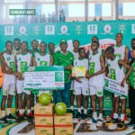 Category Manager for Beverages, Nestlé Nigeria, Mr. Olutayo Olatunji (middle) presenting a certificate to the boys from Topfield College, Ajegunle, Lagos State winners of the boys’ category of the Western Conference of the 23rd MILO Secondary Schools Basketball Championship held in Ibadan recently.