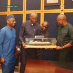 L-R Mr. Andy Odeh, GM, External Relations & Sustainable Development (NLNG); Mr. Olalekan Ogunleye, NLNG Deputy MD; and Dr. Philip Mshelbila, NLNG MD/CEO, hand over a model of an NLNG vessel to the Executive Governor of Rivers State, Sir Siminalayi Fubara, during the NLNG management’s visit to the Governor at the State House in Port Harcourt on Wednesday.