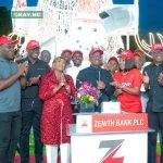 The Group Managing Director/CEO of Zenith Bank Plc, Dr. Ebenezer Onyeagwu (4th Left) flanked by the wife of the Founder and Chairman of Zenith Bank Plc, Mrs. Kay Ovia (3rd Left); Executive Director, Mr. Henry Oroh (1st Left); Executive Director, Dr. Temitope Fasoranti (2nd Left); Executive Director, Mrs Adobi Nwapa (2nd Right); and Executive Director, Mr. Akin Ogunranti (1st Right) at the 2023 Zenith Bank Christmas Light-Up of Ajose Adeogun Street, Victoria Island, Lagos at the weekend.